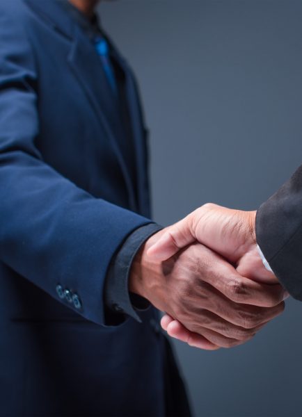 business-people-shake-hands-office